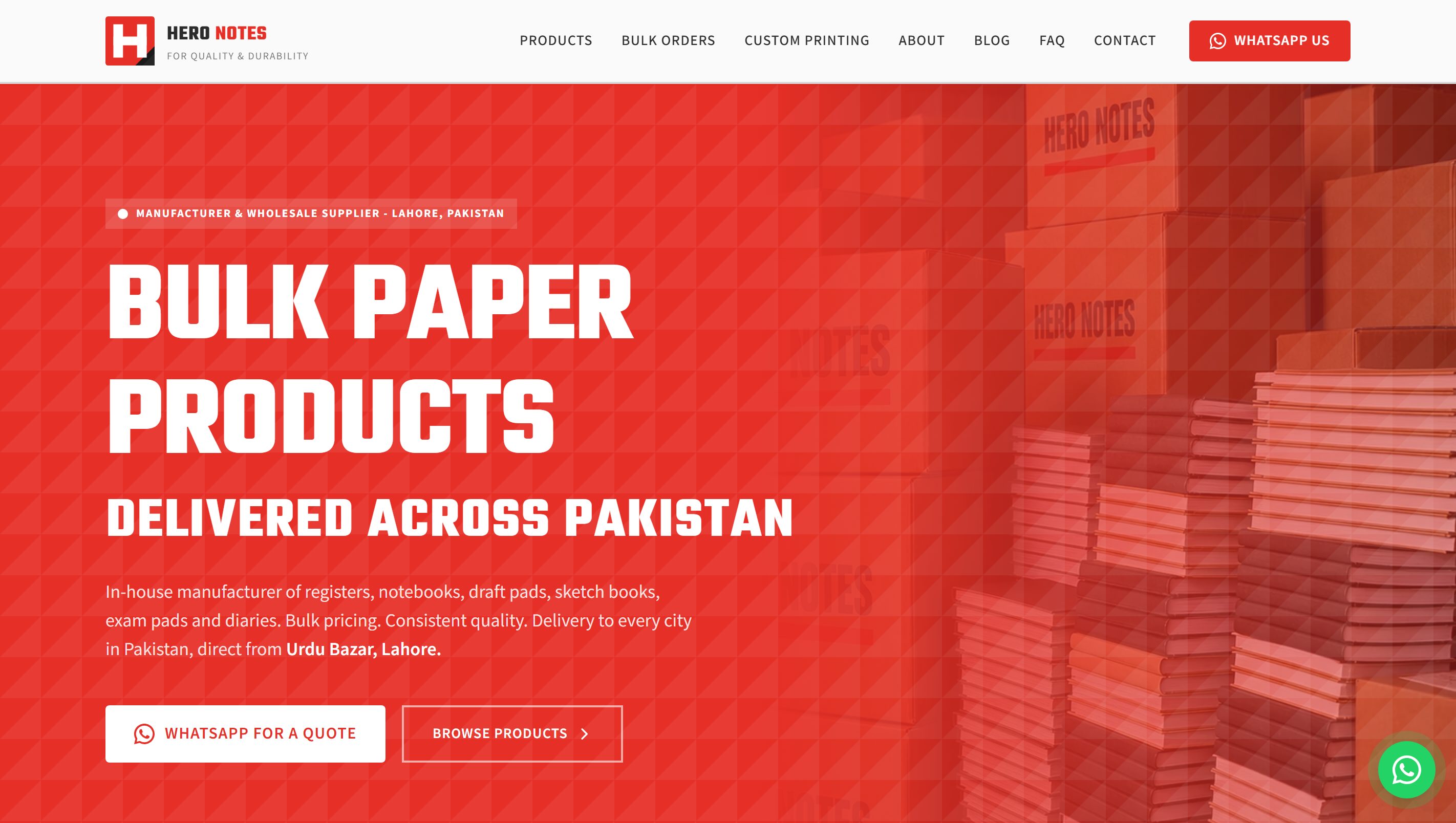 The Hero Notes homepage: a red hero reading Bulk Paper Products Delivered Across Pakistan over stacked registers.